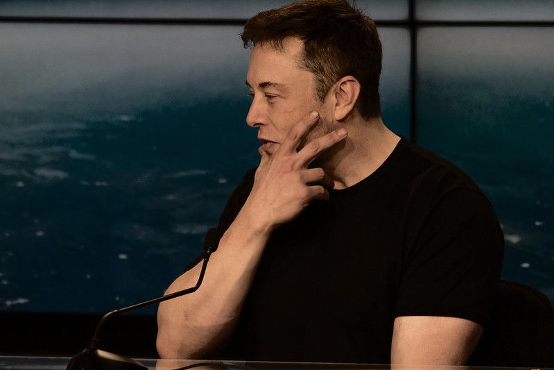 Elon Musk at a recent talk looking fit and healthy after use of new weight loss drug Wegovy