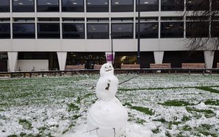 Overnight snow brings Manchester to a halt
