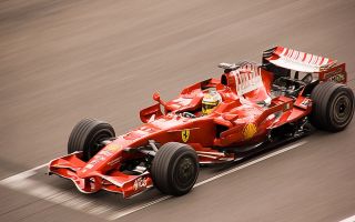 Vettel steals the show as Ferrari outgun Mercedes at Marina Bay