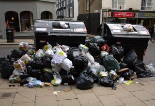 Bin strikes called off after pay rise of 11-22% agreed