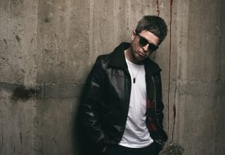 Noel Gallagher: “Cosmetically, Manchester changes… but it forever stays the same”