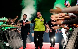 ‘Mighty Mike’ comes back from the brink to seal victory in Darts Champions League