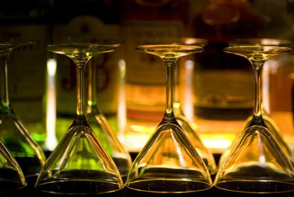 martini glasses upside down on bar