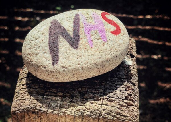 NHS on a stone