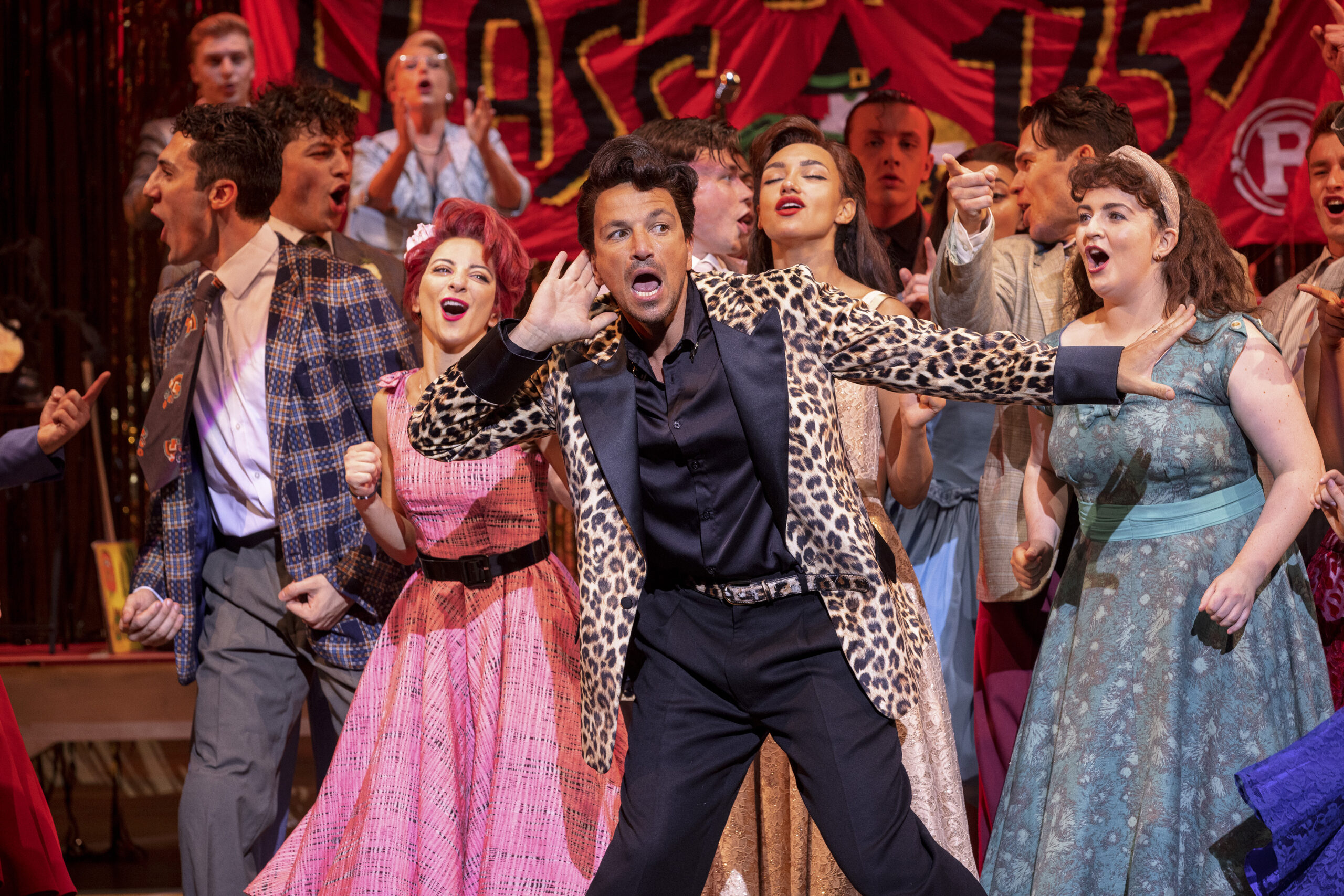 Peter Andre Front Centre As Vince Fontaine In Grease Credit Sean Ebsworth Barnes Scaled 
