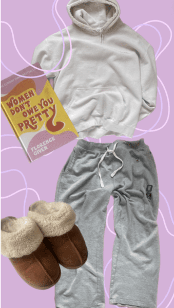 Pink background with pink swirly lines, grey joggers, light pink hoodie, brown slippers with fur and a book
