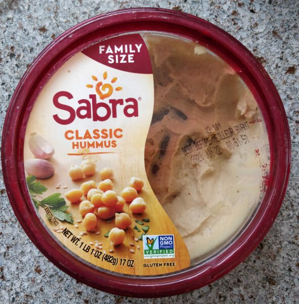 A pot of Sabra hummus