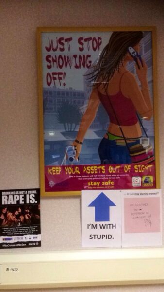 The old poster in the Kilburn building with GMP's new 'anti-rape' poster. Photo: Jess Lishak